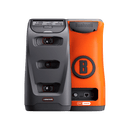 Two golf launch monitors, one black with "LAUNCH PRO," one orange with "Bushnell" and a "B" logo. They stand side-by-side.